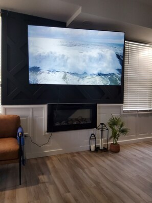 This 75 inches TV can also be viewed from the kitchen.  
