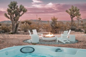 Stargaze from the hot tub or the 48" fire bowl. Or both :)