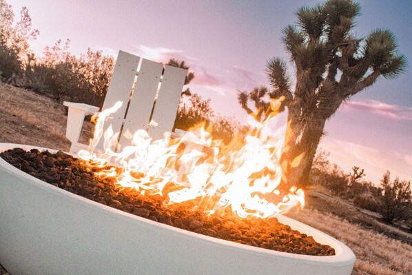 Enjoy desert views from the 48" concrete fire bowl.