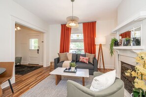 Living Room + Smart TV + Pull Out Queen Size Sofa