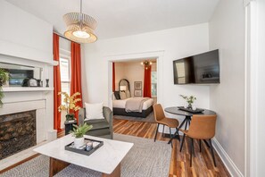 Living Room + Smart TV + Pull Out Queen Size Sofa