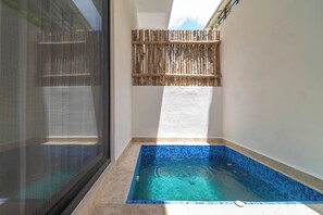 Relax poolside in your own private oasis