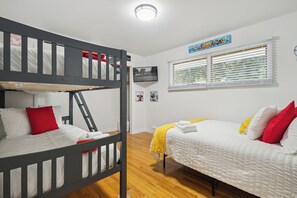Enjoy the playful and comfy bunk room, perfect for kids or friends!