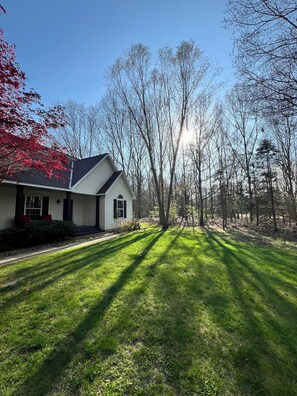 Beautiful home nestled on a large lot. Home has fenced yard, fire pit & hottub.
