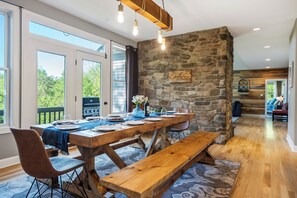 Huge farmhouse table - comfortably seats 10 adults.  Addt'l chairs for 12