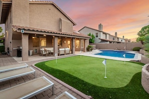 Practice your Short Game on the 4-hole Custom Putting Green