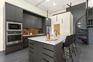 Chef's Kitchen | Stainless Steel Appliances and Large Kitchen Island
