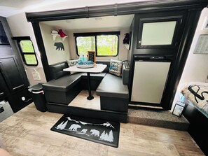 Dining area also turns into extra bed. 