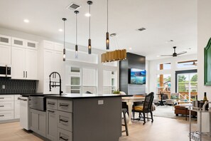 Open floor plan - kitchen, dining and living area