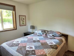 Bedroom with queen bed.