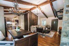 From making and enjoying a wonderful meal to relaxing quietly to making memories, luxury and comfort are waiting for you in open living room and dining area. 