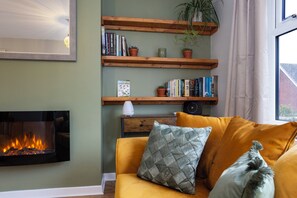 Living Room with fireplace & broadband router