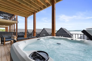 Private hot tub on back deck with amazing lake views