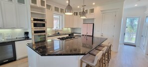 Indoors, Kitchen, Kitchen Island, Floor, Cooktop