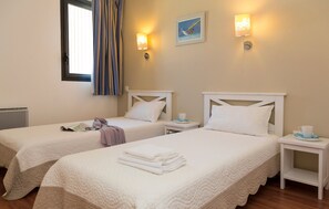 Get a good night's sleep in the cozy Single beds in the second bedroom.