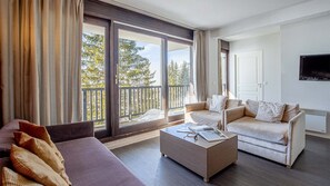 Relax and rejuvenate in the cozy living room.