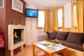 Relax and rejuvenate in the living room of our ski-in/ski-out chalet!