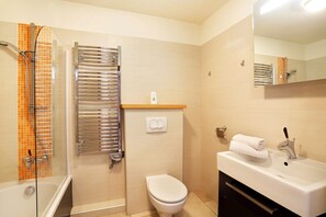 Get ready for your day in the lovely bathroom.