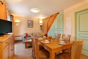 Share meals and laughs at the dining table.