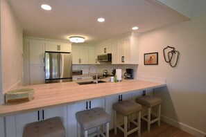 Kitchen is stocked with everything you need for cooking meals 