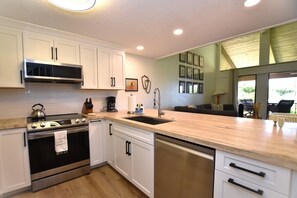 Kitchen is stocked with everything you need for cooking meals 