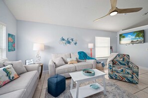 A touch of blue and sea-themed decor in our cozy living space