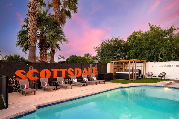 Enjoy our private pool surrounded by plenty of poolside loungers and a hot tub