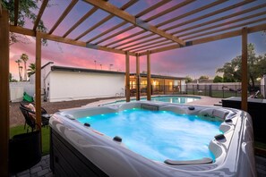 Indulge in our hot tub with a view that complements relaxation