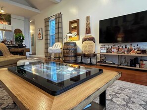 Living Room: Perfect for gatherings, our Infinity Game Table offers over 100+ free games!