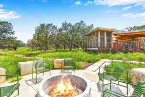 Share stories and laughs with company around the firepit