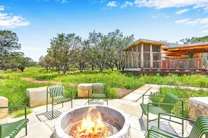 Share stories and laughs with company around the firepit