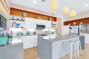 The kitchen is adjacent to the living room of the Blue Yodel