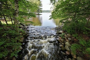 Fall asleep to the sound of rapids cascading down the logging dam.