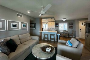 Living room adjacent to kitchen. A great place to visit with family and friends.