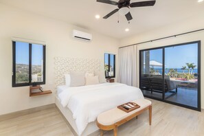 King - size bed in the master bedroom of main house. Sleep like royalty. 