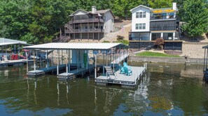 Water toys, dock in No wake cove