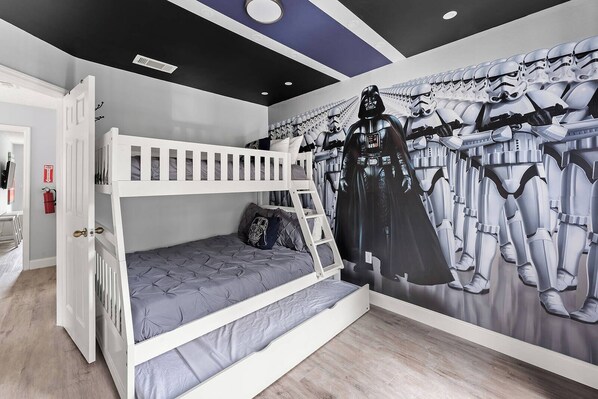 Stunning Star Wars-inspired bedroom with a bunk bed and Tv.