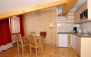 Settle into the dining area and enjoy a nice meal.