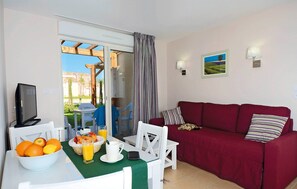 Lounge on the plush sofa at the end of the day and watch the TV with your group