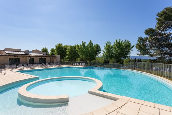 Dive into the lovely seasonal outdoor pool during the summer.