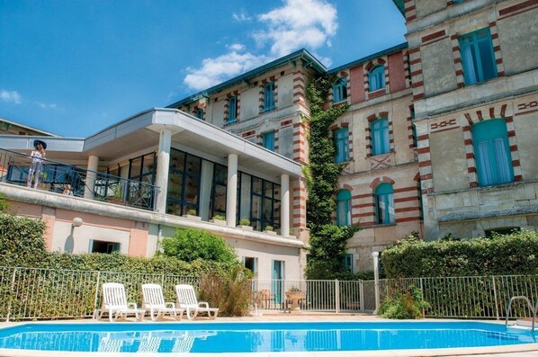 Take in gorgeous views while lounging around the on-site outdoor pool.