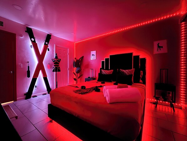 Your private fantasy escape--where luxury meets kink. St. Andrew's Cross, LED Vibes, and indulgence await. 