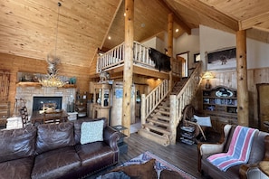 Cozy and spacious main living ares with a  gas fireplce