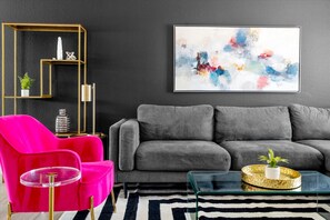 Comfort meets contemporary in our living area with plush, modern sofas