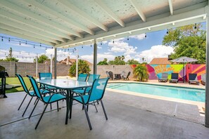 Enjoy outdoor meals with seating for six in our backyard
