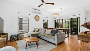 Step into our cozy and inviting living room, where comfort meets tranquility. Sink into plush sofas, enveloped in soft throws, and bask in the warm glow of ambient lighting. With its soothing palette and thoughtful touches, our living room invites you to 