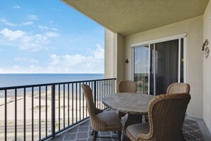 View from the balcony accessible from living room and primary bedroom. Dining table for 4.