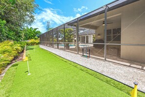 60 feet private putting green with six holes. Great for adults and kids!