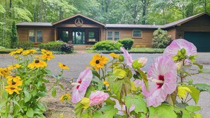 The cabin is located on 2 acres of private woods.