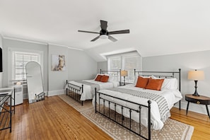 Enjoy ample space and comfort in our large 2nd floor bedroom with 2 queen beds. 